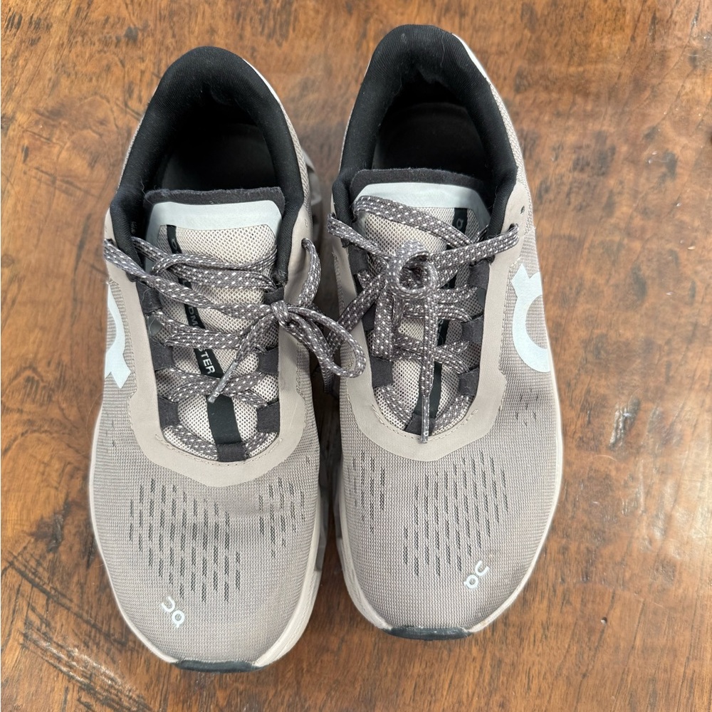 On Running Taupe and Black Sneakers